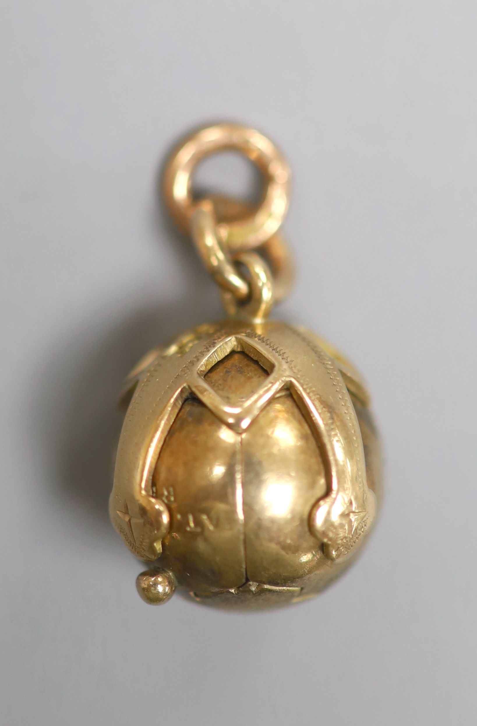 A 9ct and white metal masonic ball pendant